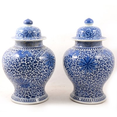 Lot 1 - A pair of Chinese blue and white covered vases
