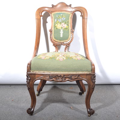 Lot 381 - Victorian carved walnut nursing chair, wool work upholstery