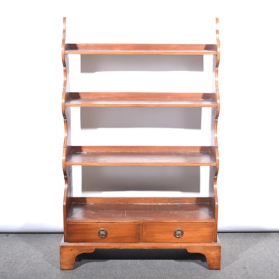 Lot 377 - Mahogany open waterfall bookcase.