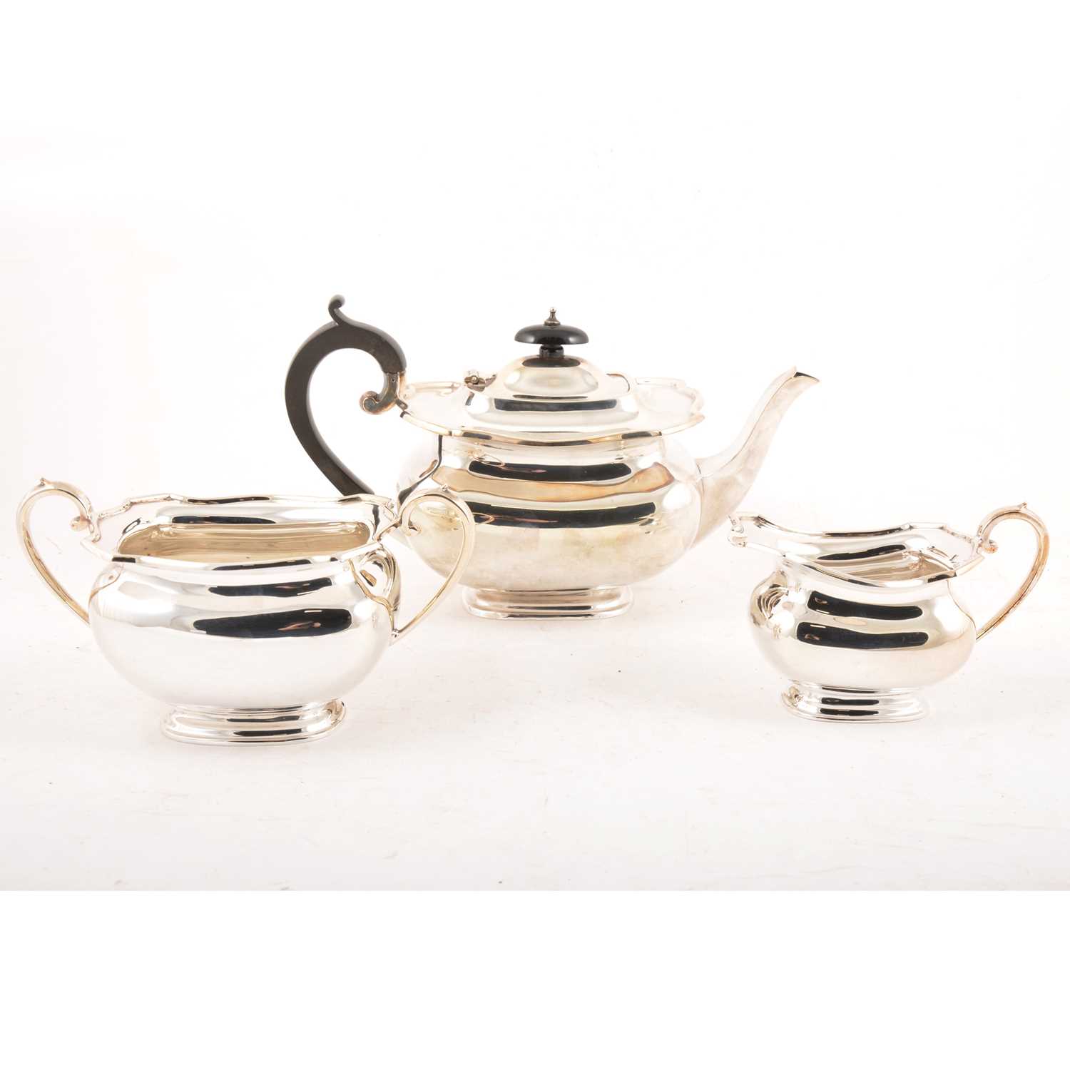 Lot 217 - A three-piece silver tea set by Jenkins & Timm, Sheffield 1924