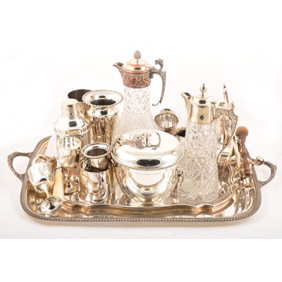 Lot 118 - A collection of silver-plated wares, to include trays, claret jugs, vases, goblets etc.