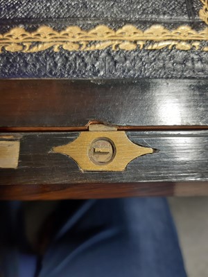 Lot 96 - A walnut writing slope with fitted interior and functioning key.