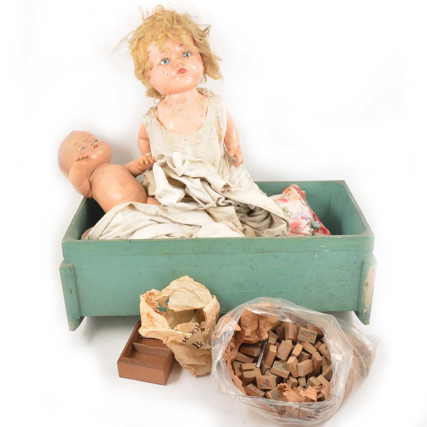 Lot 133 - Two composition head dolls, wooden crib, Mahjong set, and a selection of vintage tennis rackets