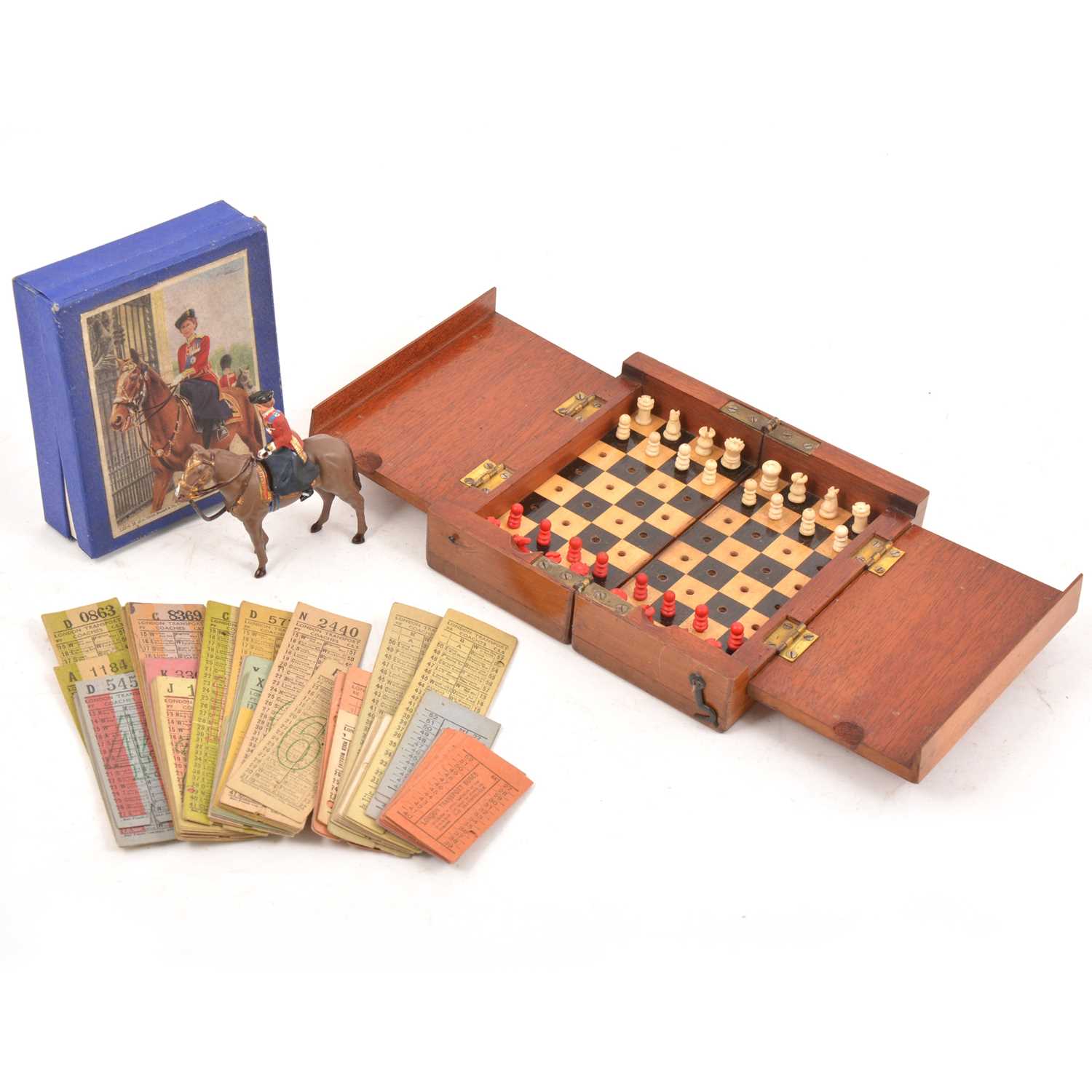 Lot 120 - An early 20th Century mahogany cased travel chess set, with full set of pieces, brass hinges, etc