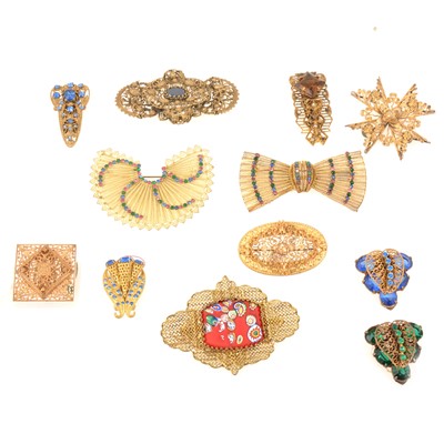 Lot 267 - Twelve 1930s Czechoslovakian yellow metal filigree brooches and dress clips.