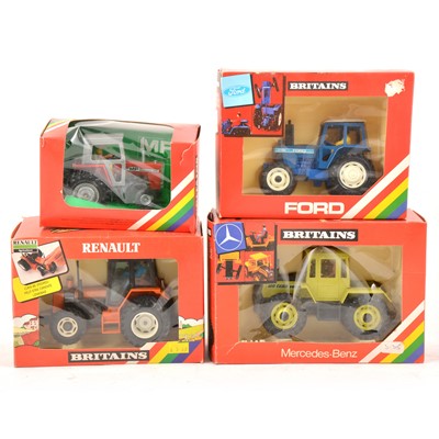 Lot 243 - Britains Toys; four model tractors including no.9529 Massey Ferguson (dual wheels) etc