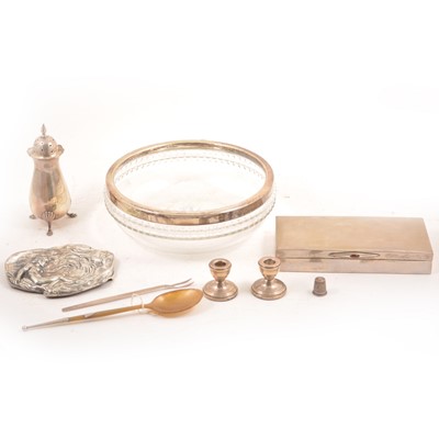 Lot 202 - A silver caster, pair of dwarf candlesticks, and other small silver and white metal items.