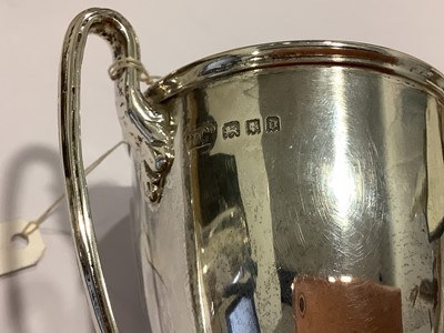Lot 207 - A silver trophy cup and a silver christening cup