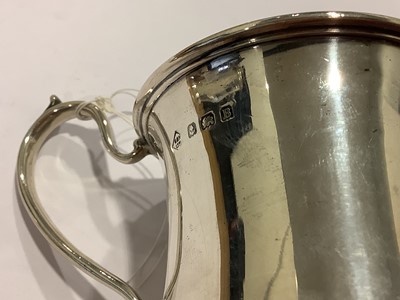 Lot 207 - A silver trophy cup and a silver christening cup