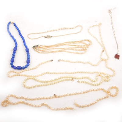 Lot 271 - A box of simulated pearl necklaces, costume jewellery earrings, chains, brooches, paste necklace.