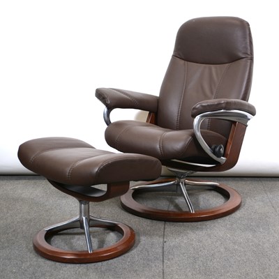 Lot 454 - Stressless brown leather easy chair and stool.