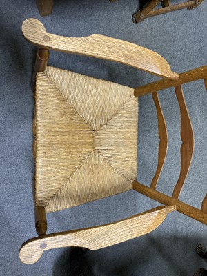 Lot 408 - Set of four ash 'Russell' ladderback dining chairs by Neville Neal, after the design by Ernest Gimson