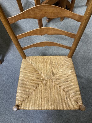 Lot 408 - Set of four ash 'Russell' ladderback dining chairs by Neville Neal, after the design by Ernest Gimson