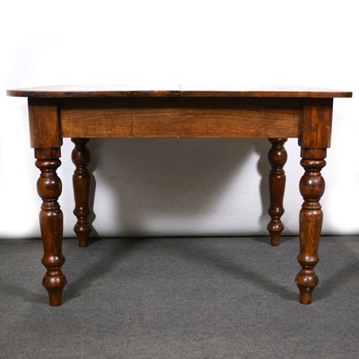 Lot 488 - Edwardian oak dining table