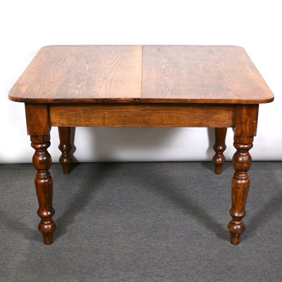 Lot 488 - Edwardian oak dining table