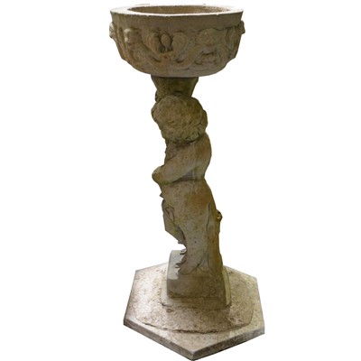 Lot 600 - Small reconstituted stone garden urn and a cherub bird bath