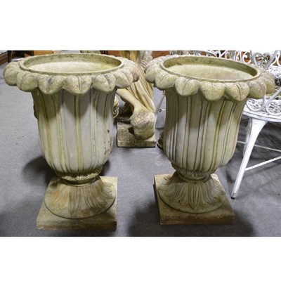 Lot 596 - Pair of reconstituted stone garden urns