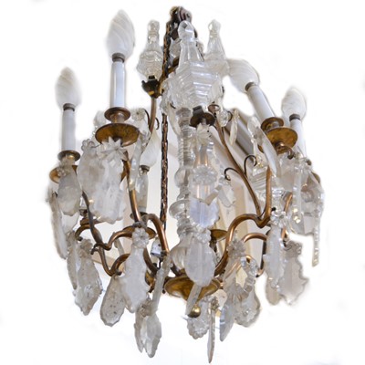 Lot 578 - Brass and cut glass chandelier