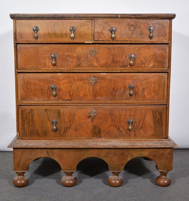 Lot 540 - Walnut chest on stand.