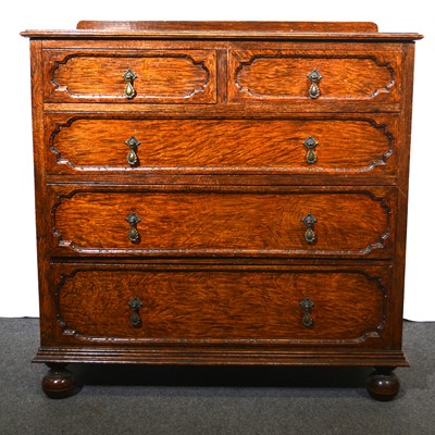 Lot 431 - An oak chest of drawers.