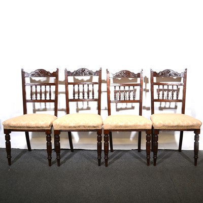 Lot 387 - Four late Victorian stained walnut dining chairs.