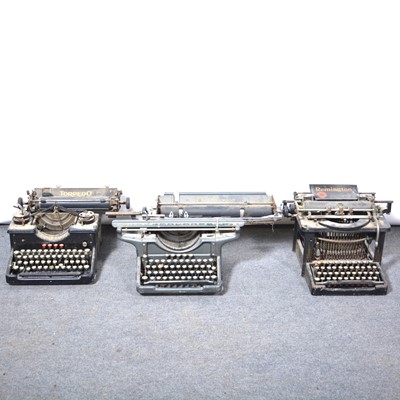 Lot 545 - Cast iron doorstop and three vintage typewriters