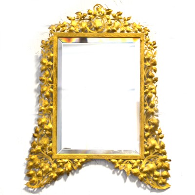 Lot 532 - A pierced gilt metal easel mirror.