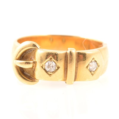 Lot 194 - 18 carat gold buckle ring set with two diamonds.