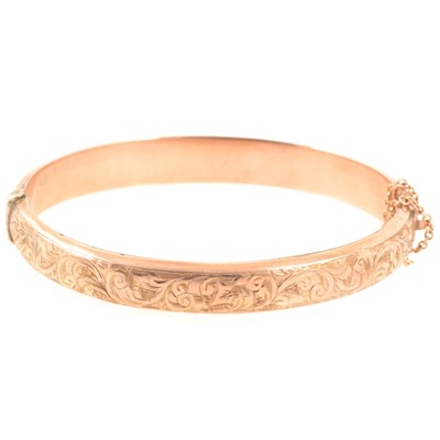 Lot 206 - A 9 carat rose gold Victorian style half hinged bangle.