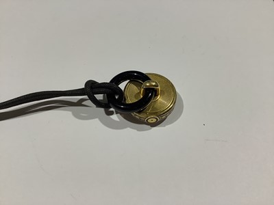 Lot 239 - Cartier - an Art Deco pendant fob watch, black enamel decoration.