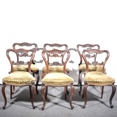 Lot 112 - A set of six Victorian rosewood balloon back chairs.