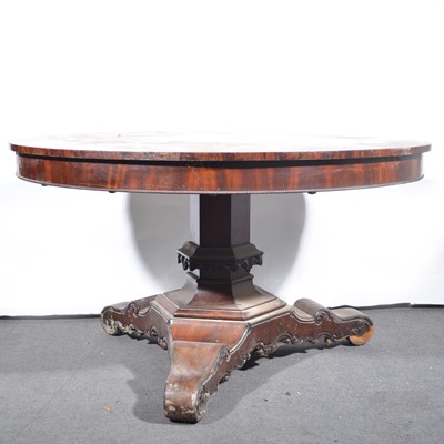 Lot 113 - A Victorian mahogany tilt-top dining table.