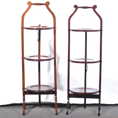 Lot 421 - Two similar three-tier folding cake stands.