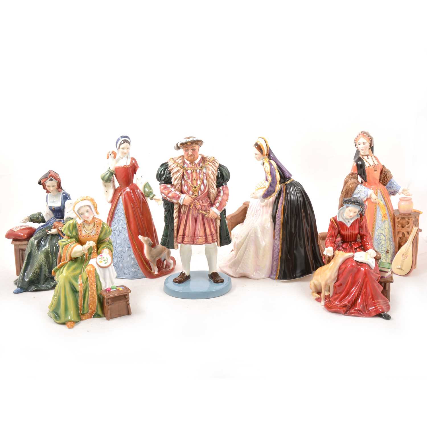 Lot 31 - Royal Doulton figures of King Henry VIII and his wives.