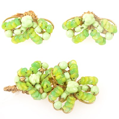 Lot 275 - Miriam Haskell - a green beaded suite of brooch and matching earrings.