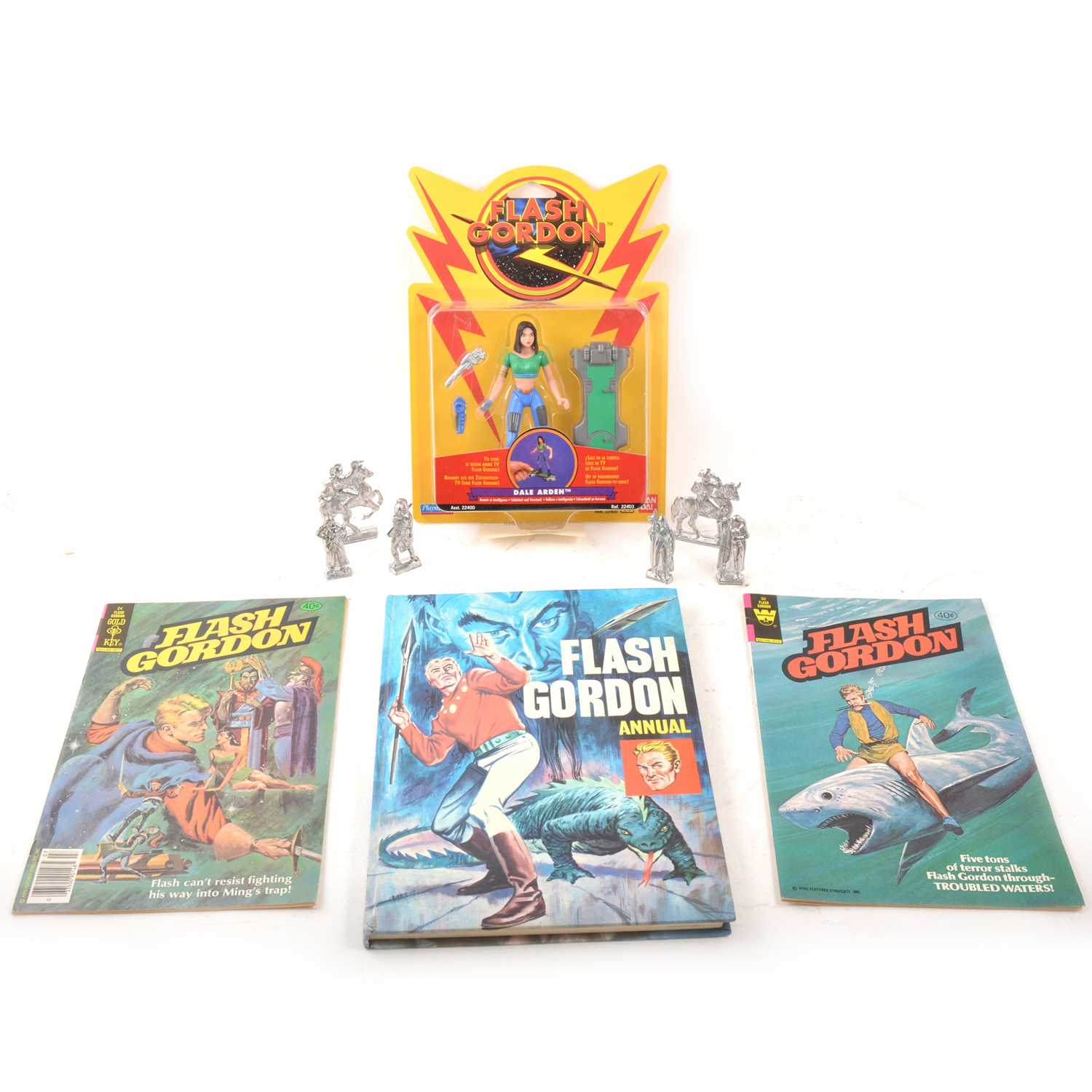 Lot 19 - Flash Gordon interest, a selection of publications and books, figures and comics.
