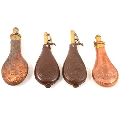 Lot 217 - Brass and leather powder flasks.