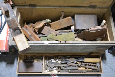 Lot 79 - Small stained pine carpenter's tool chest and contents, including brace, moulding planes, etc.
