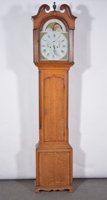 Lot 583 - Oak longcase clock