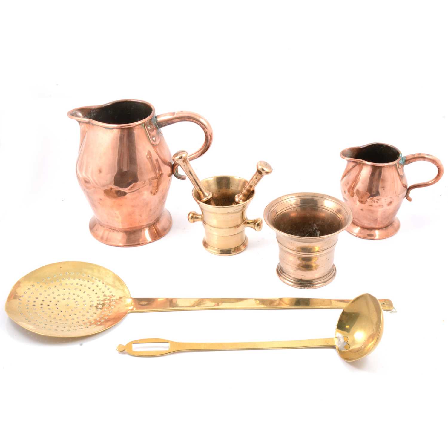 Lot 126 Two mortars and pestle, and two copper jugs,