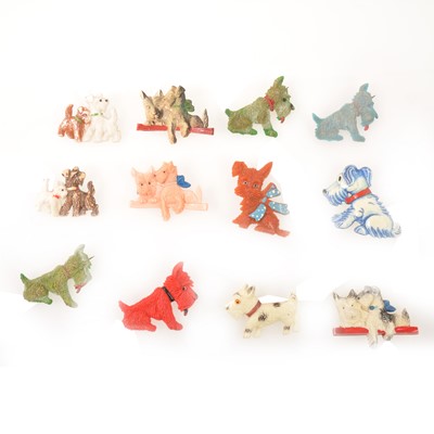 Lot 262 - Twelve vintage celluloid and plastic Scottie dog brooches