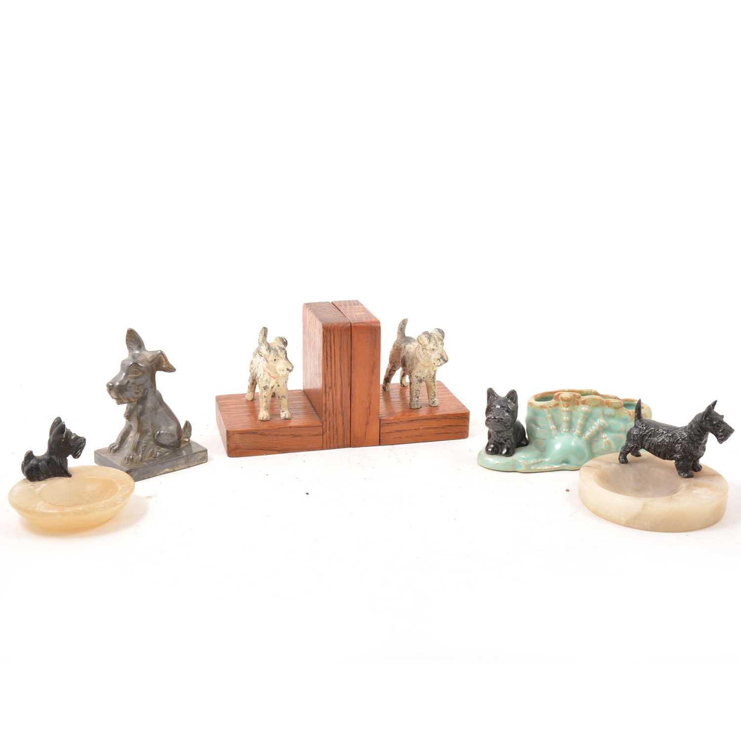Lot 75 - Scottie Dog related collectables, book ends, ashtrays, money box.