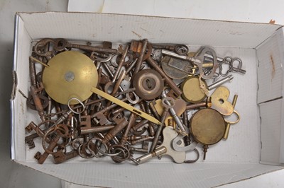 Lot 89 - A collection of 18th Century and later keys and brass door knockers