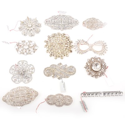 Lot 281 - Twelve large clear paste costume jewellery brooches, vintage circa 1930, floral and Deco designs.