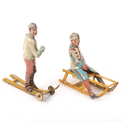 Lot 333 - Two early 20th century tin-plate penny toys.