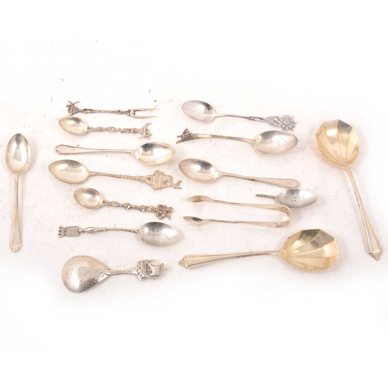 Lot 165 - Quantity of silver flatware, teaspoons, fruit spoons, souvenir spoons, golf interest.