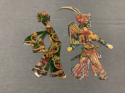 Lot 88 - Ten Chinese Tang Shan articulated leather shadow puppets, boxed.