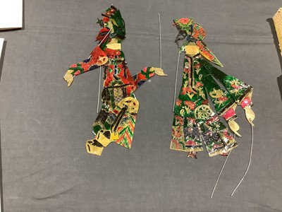 Lot 88 - Ten Chinese Tang Shan articulated leather shadow puppets, boxed.
