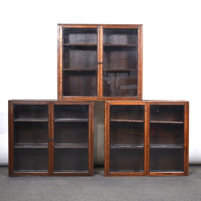 Lot 496 - Set of four oak library bookcases