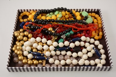 Lot 290 - Fourteen large bead necklaces, plastics and glass, 1950's and later, simulated lapis and amber/